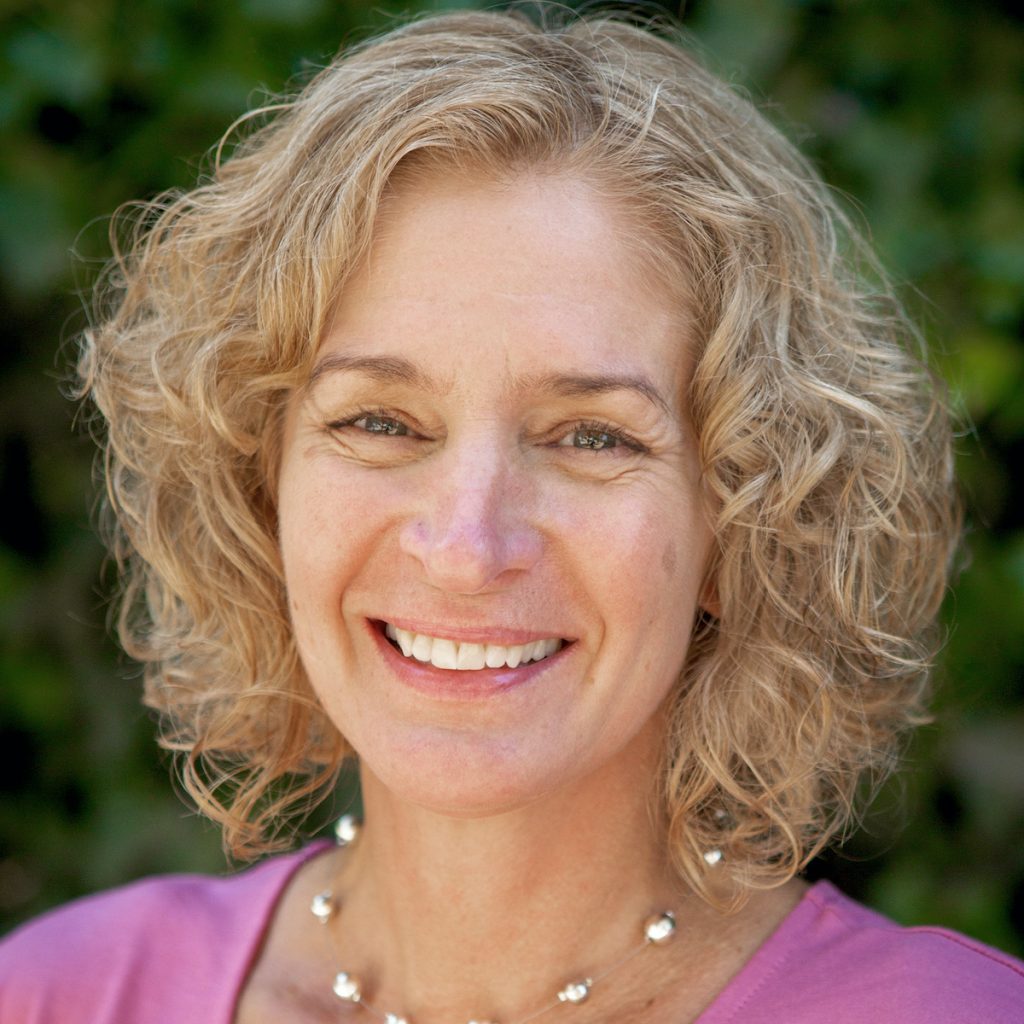 Kelly Acheson smiling warmly