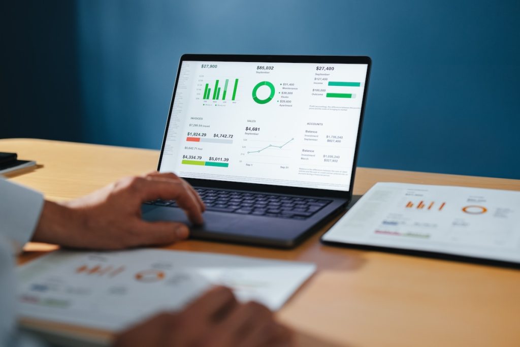 Person using budgeting app on laptop