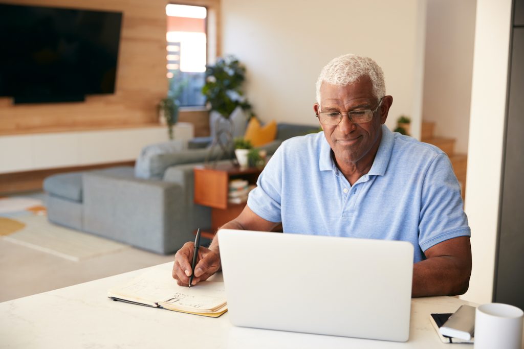 Senior man on computer